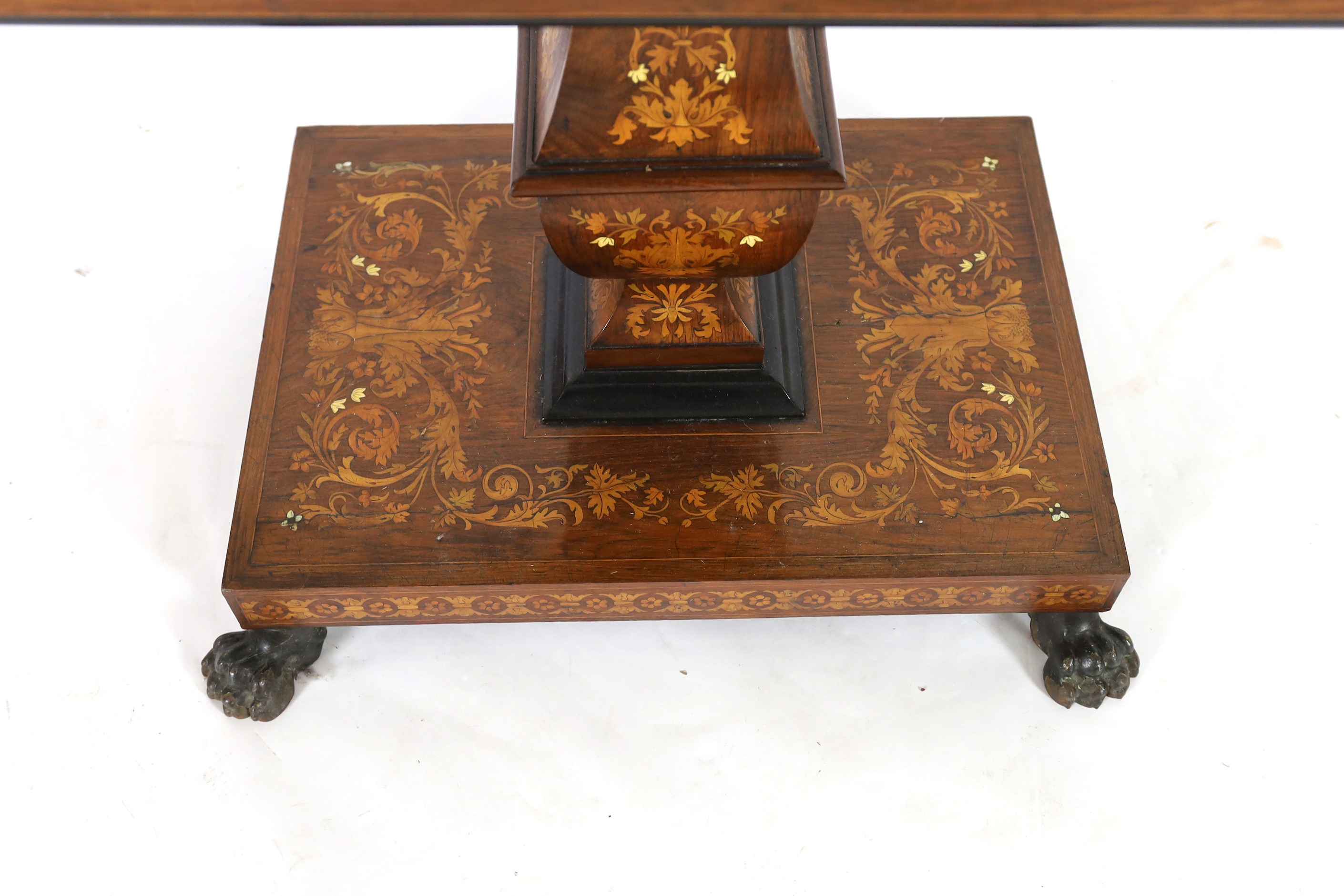 A 19th century Dutch walnut and marquetry tilt top centre table 117 x 72cm. Height 78cm.